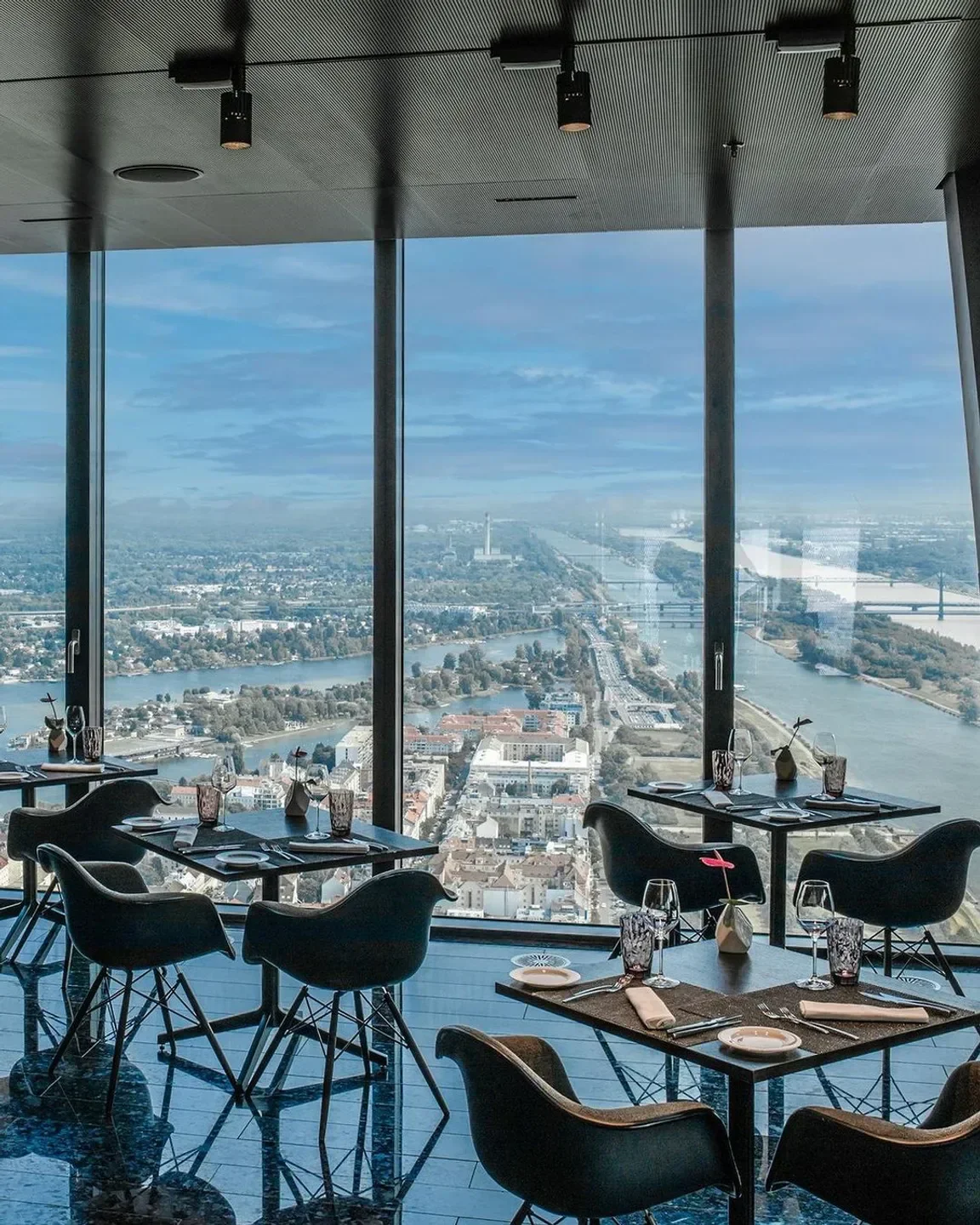 Dining with a view at 57 Restaurant & Lounge, overlooking the cityscape of Vienna.