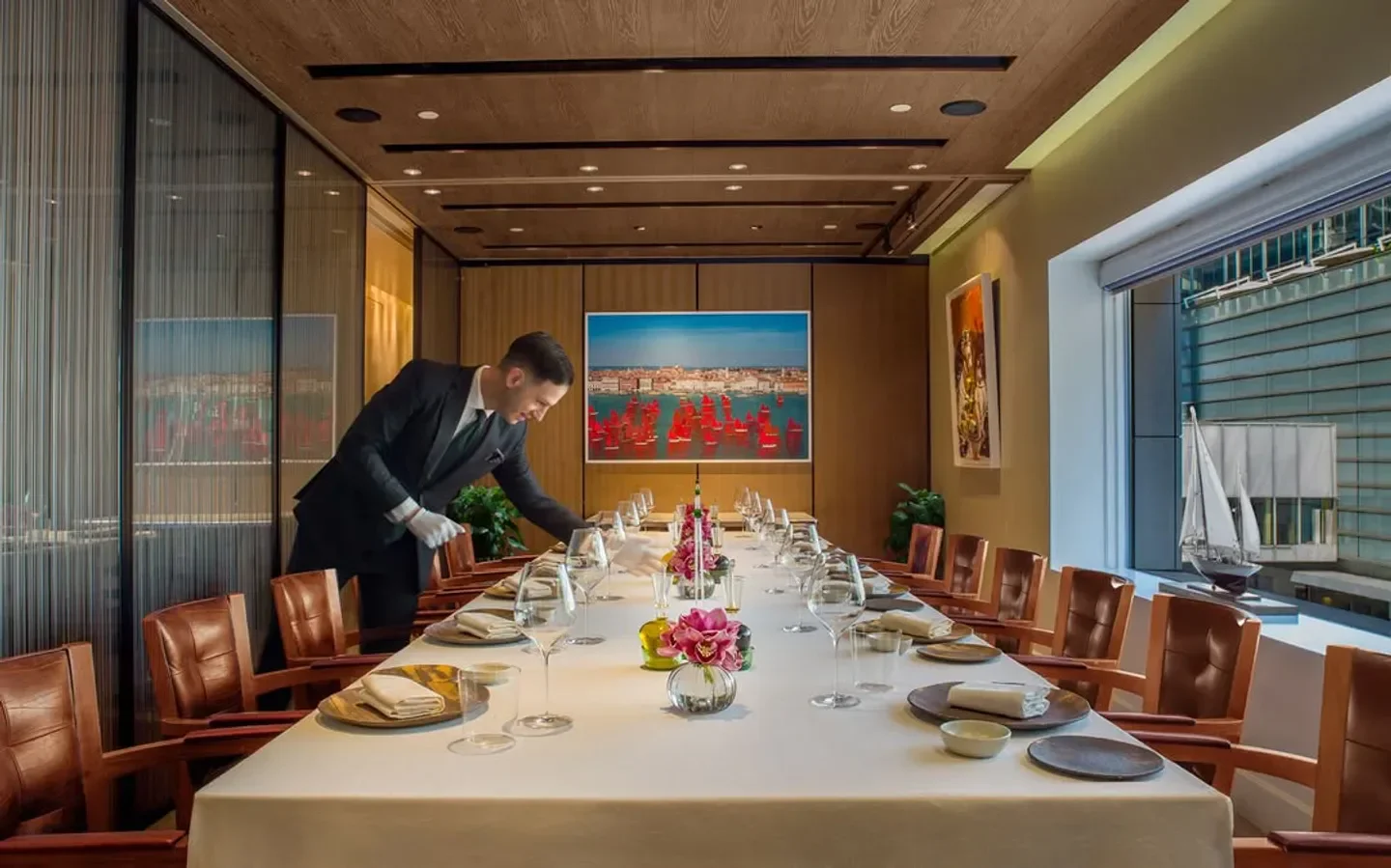 Elegant dining room at 8½ Otto e Mezzo - Bombana in Hong Kong, ready for service.