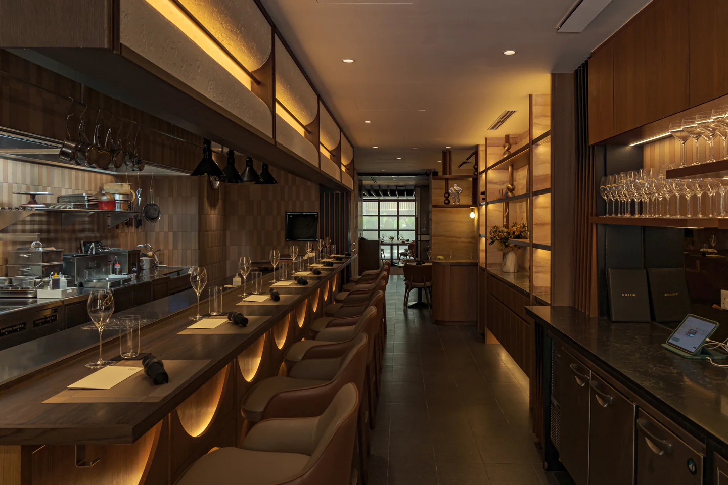 Counter seating overlooking the open kitchen at Willow, Singapore.