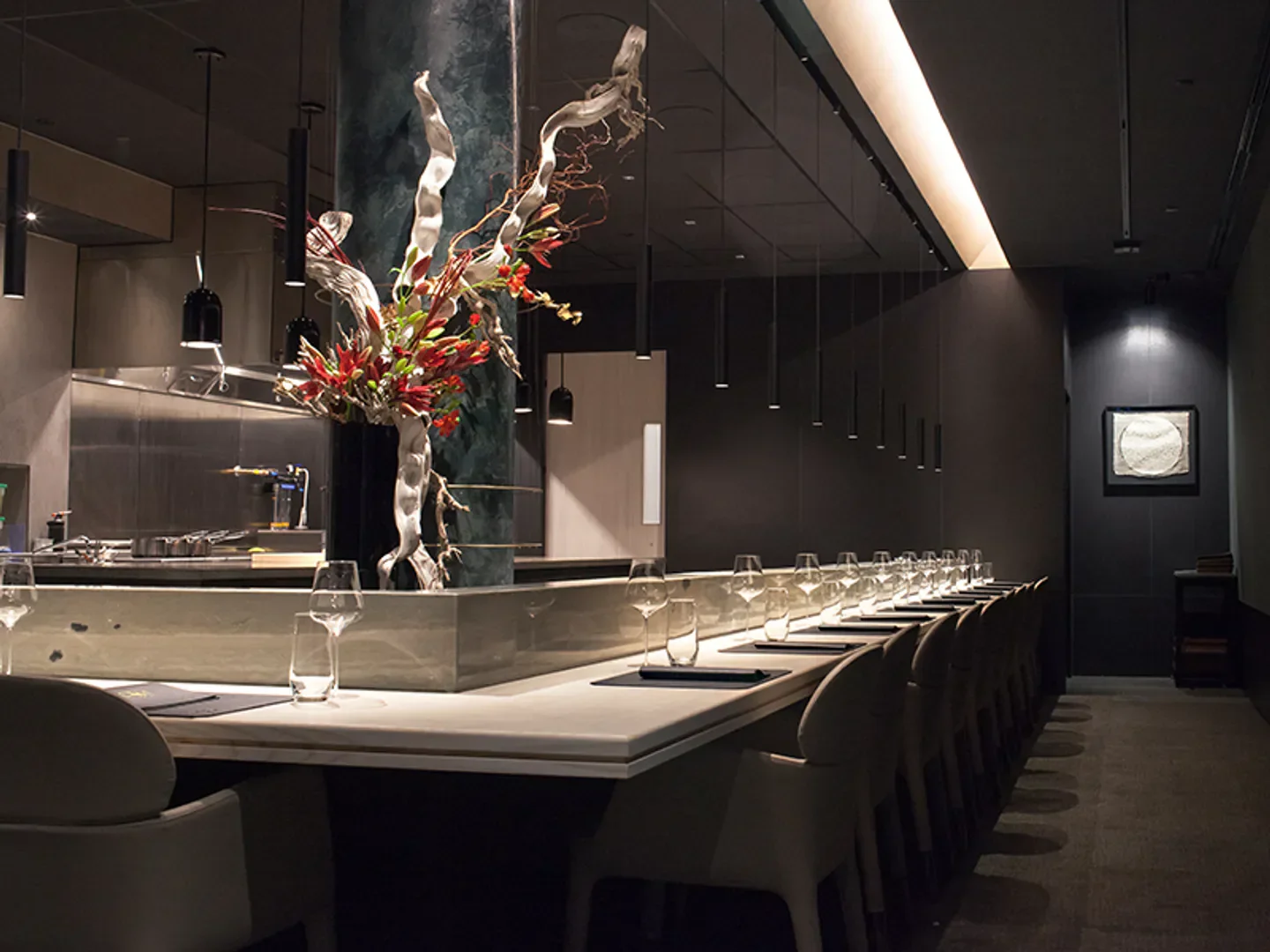 Elegant dining space at Aburi Hana restaurant in Toronto, with unique floral decor.
