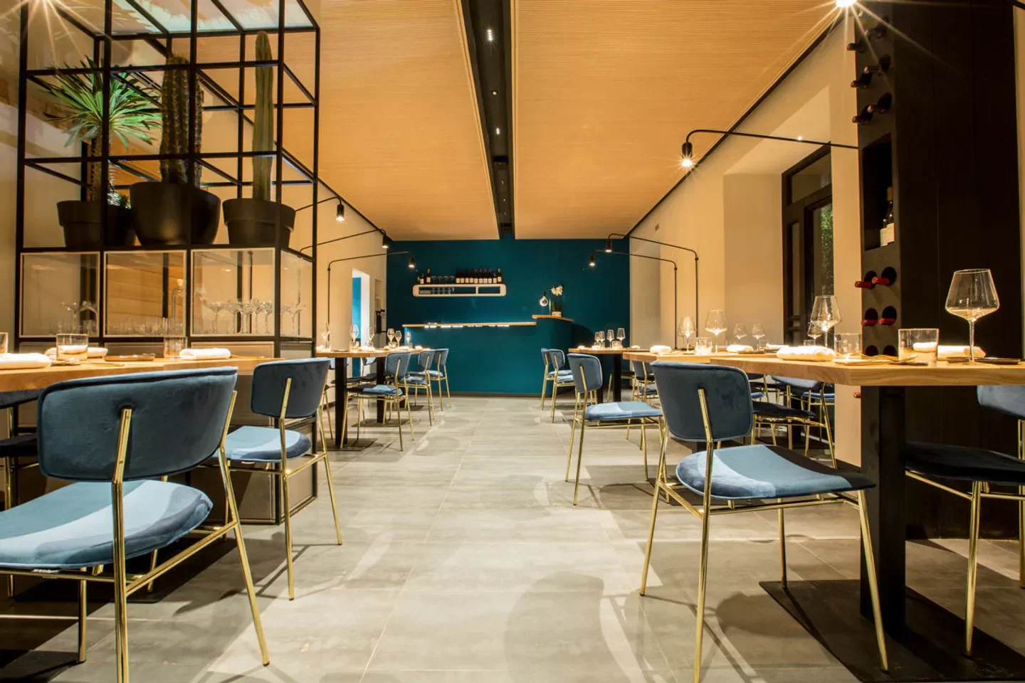 Stylish interior of AlmĂ to restaurant in Rome, featuring elegant seating and decor