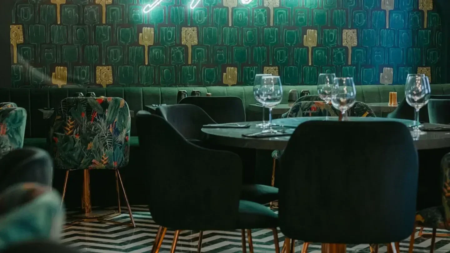 Interior of Amazonia restaurant in Paris, featuring stylish seating and artistic wall decor
