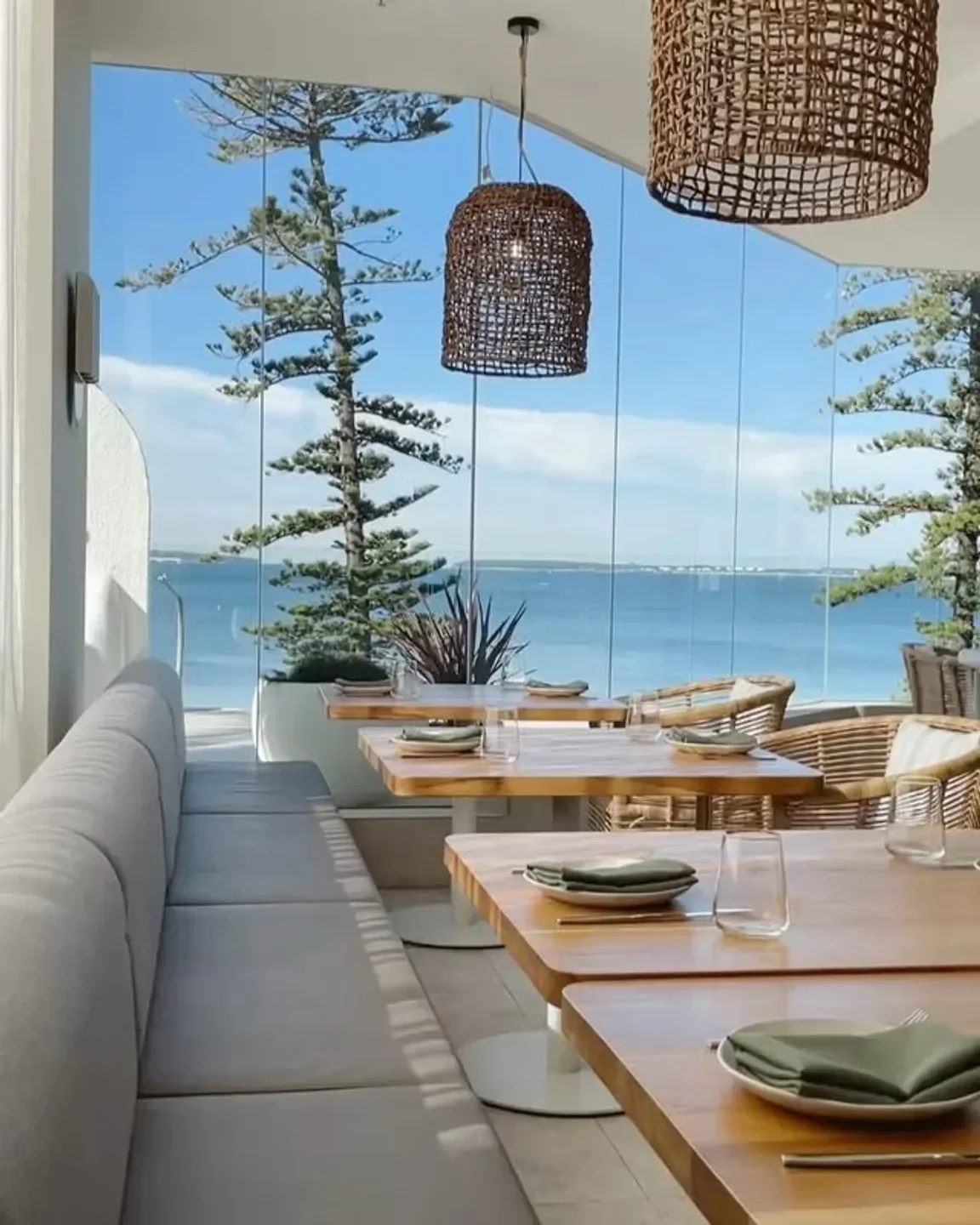 Dining area with ocean views at Ammos Brighton restaurant in Sydney.