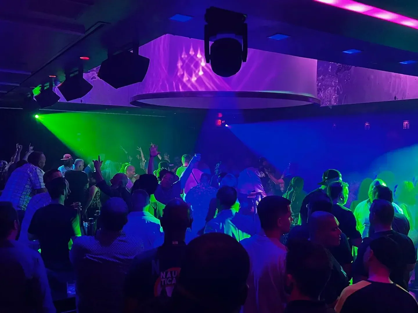 Energetic crowd at Anthem nightclub in Atlantic City, enjoying the party under colorful lights.