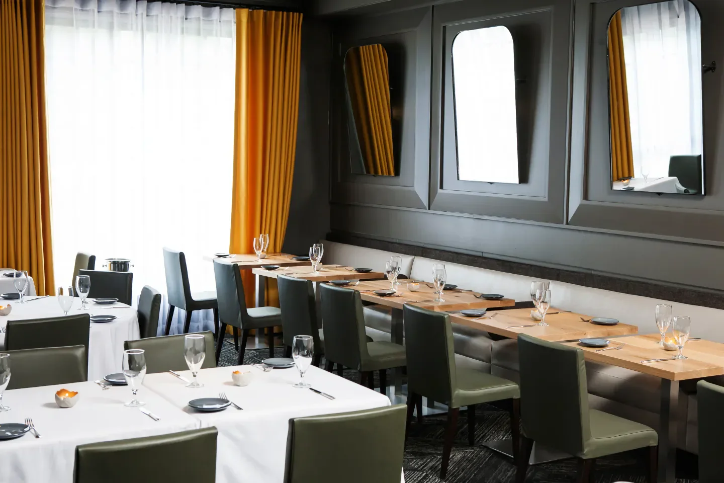 Elegant dining room interior at Aria restaurant in Atlanta with stylish decor