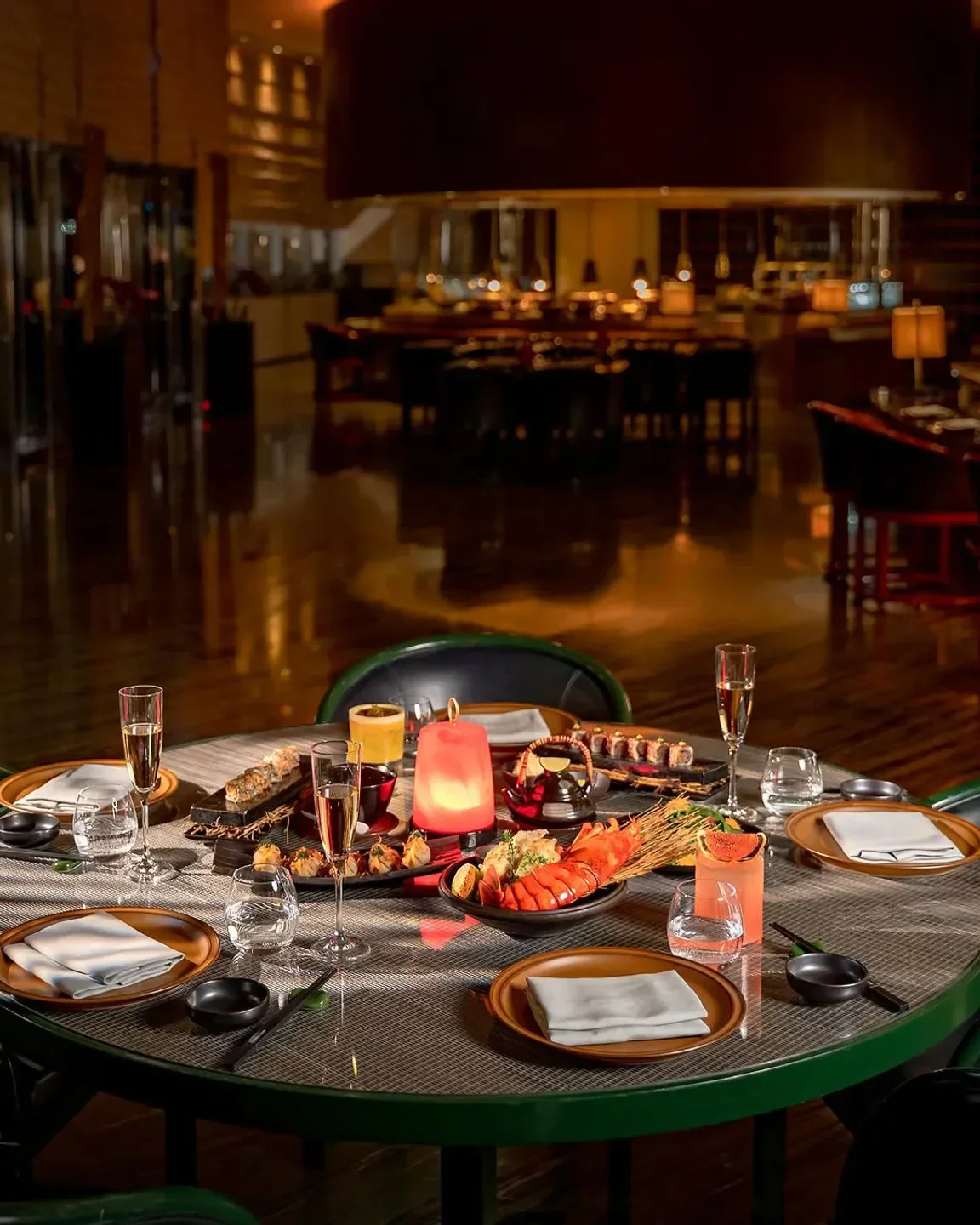 Elegant dining table at Armani Hashi in Dubai, showcasing sushi and lobster dishes