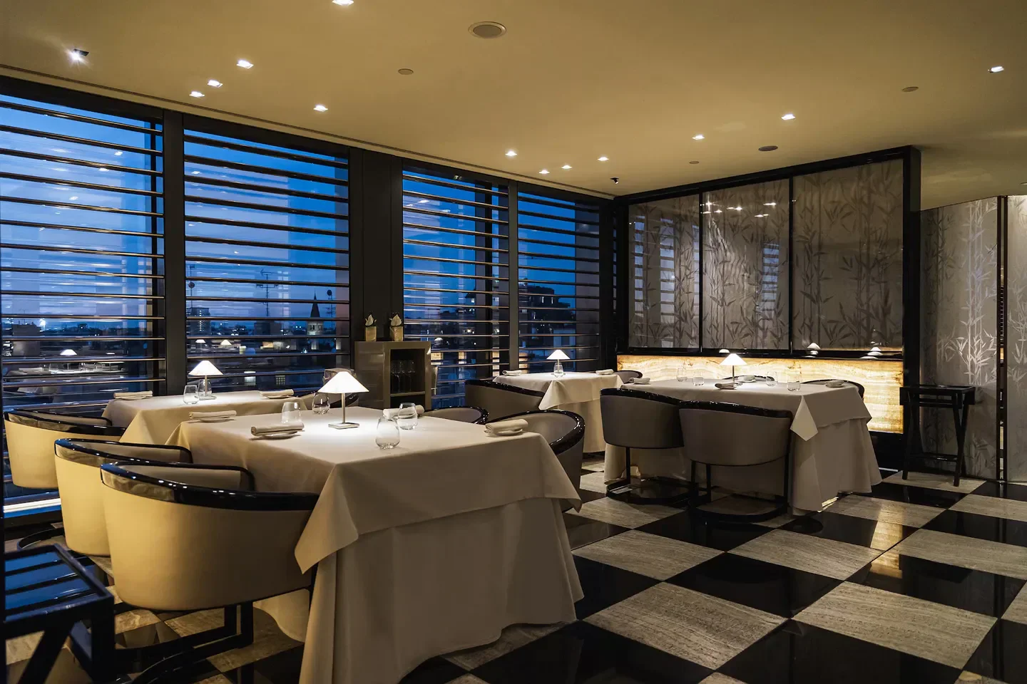 Elegant dining room at Armani Ristorante - Tokyo, overlooking the city skyline of Tokyo.