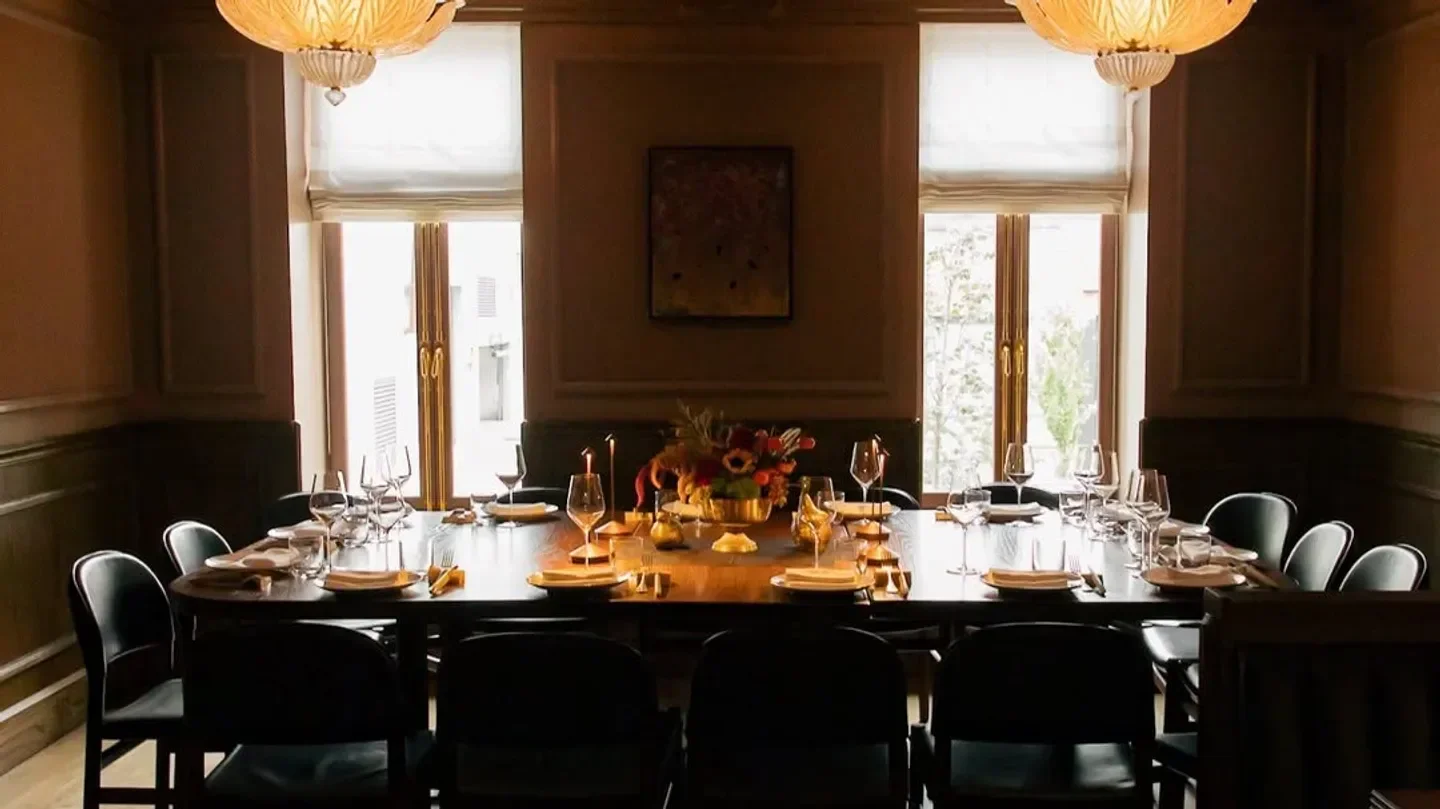 Elegant dining room at Asador Bastian Chicago, set for a special occasion.