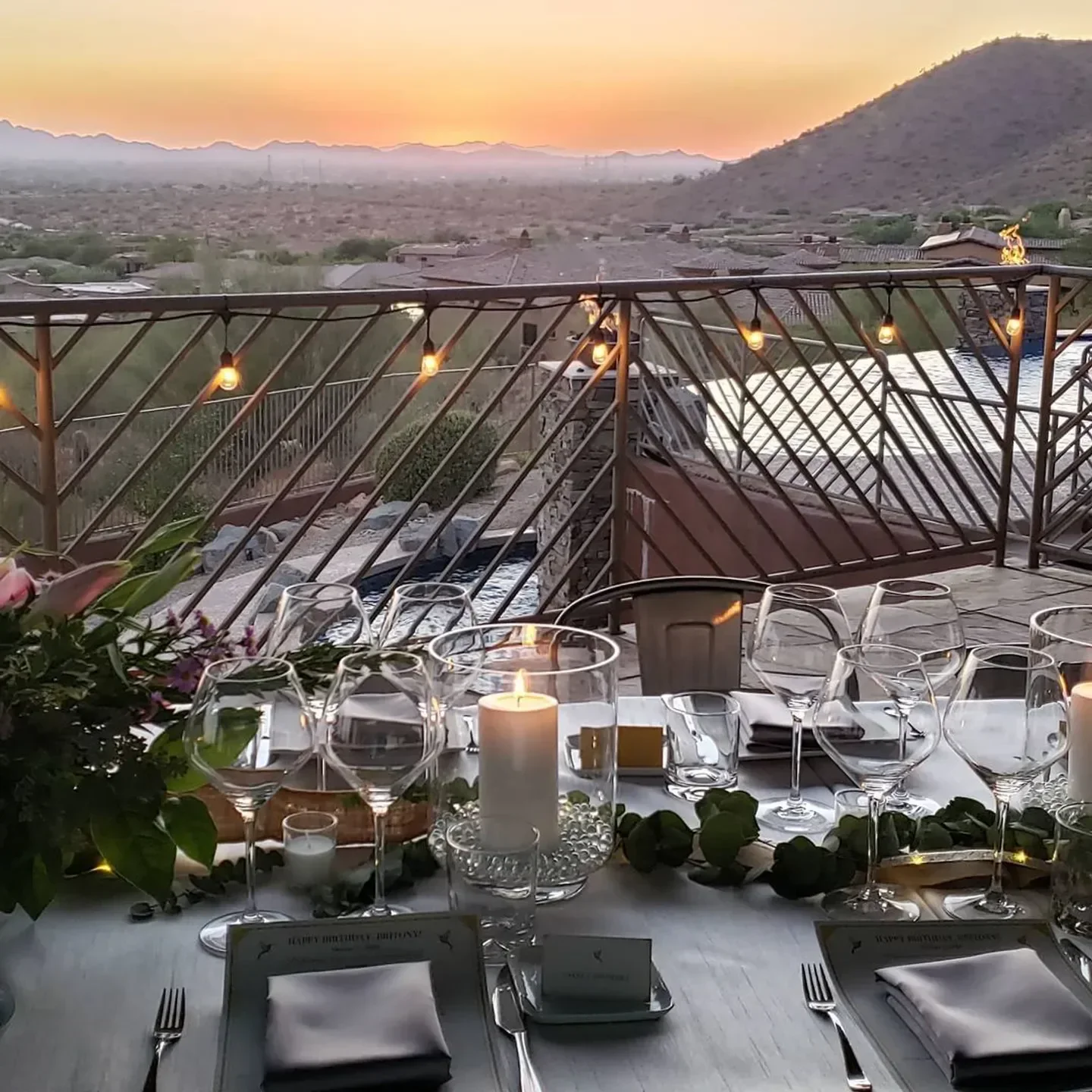 Outdoor dining setup at Atlas Bistro in Scottsdale, with sunset views and elegant table setting.