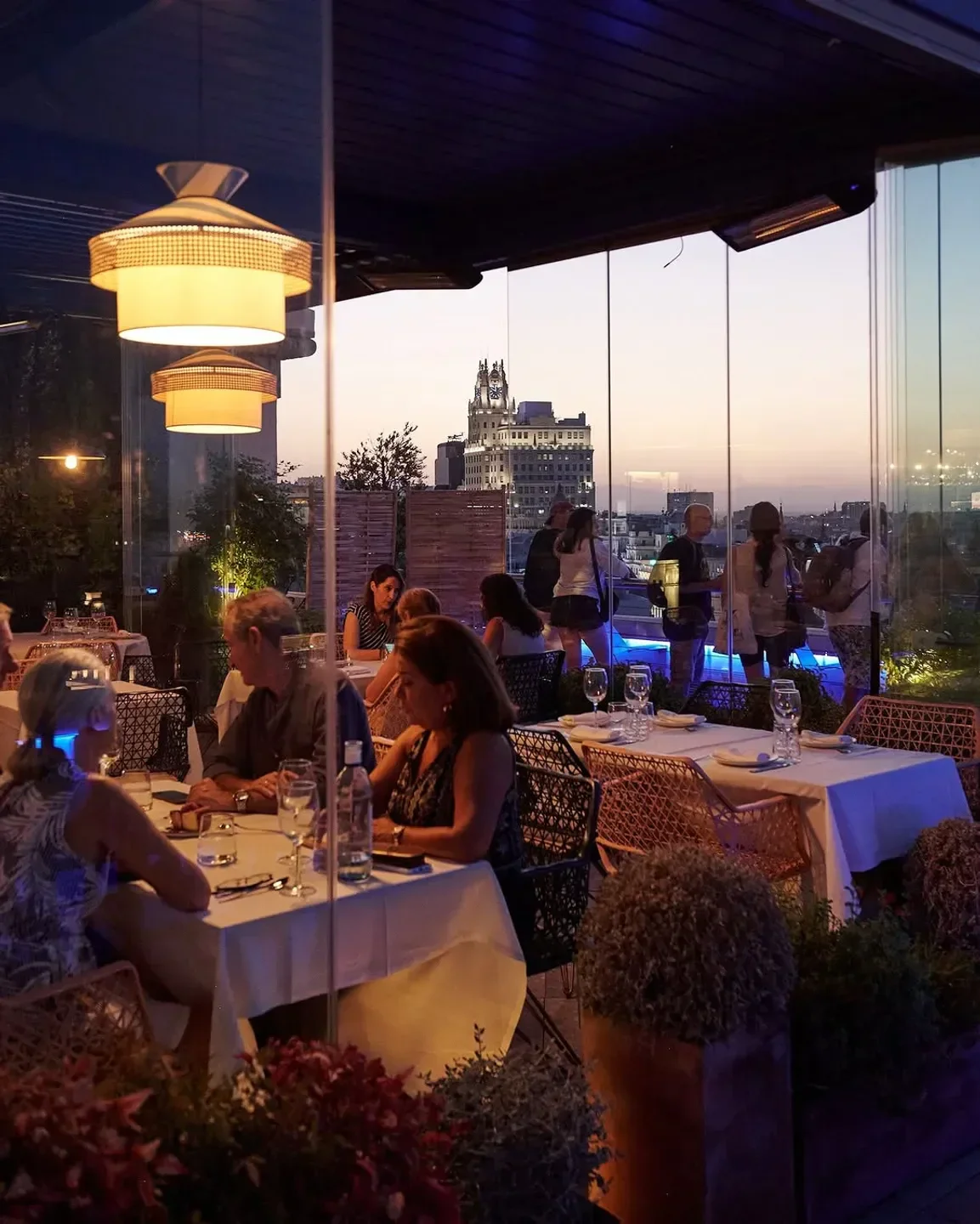 Dining at Azotea del Círculo in Madrid with stunning city skyline views.