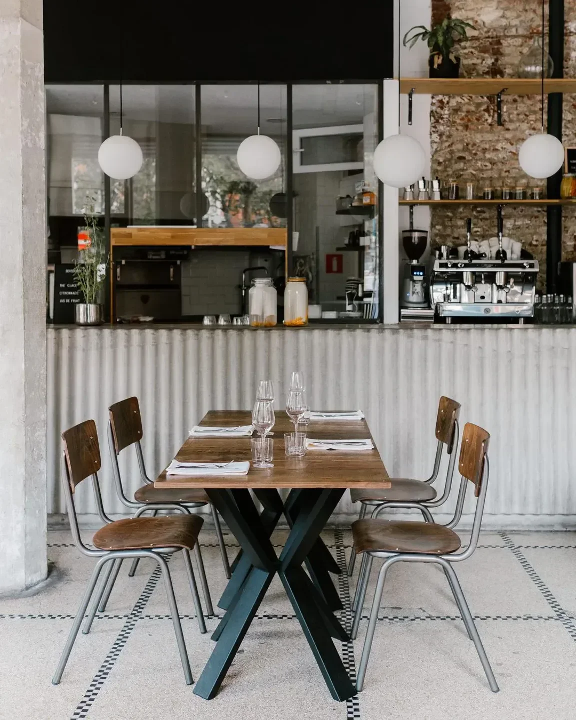 Interior of Barge restaurant in Brussels with stylish tables and modern decor.
