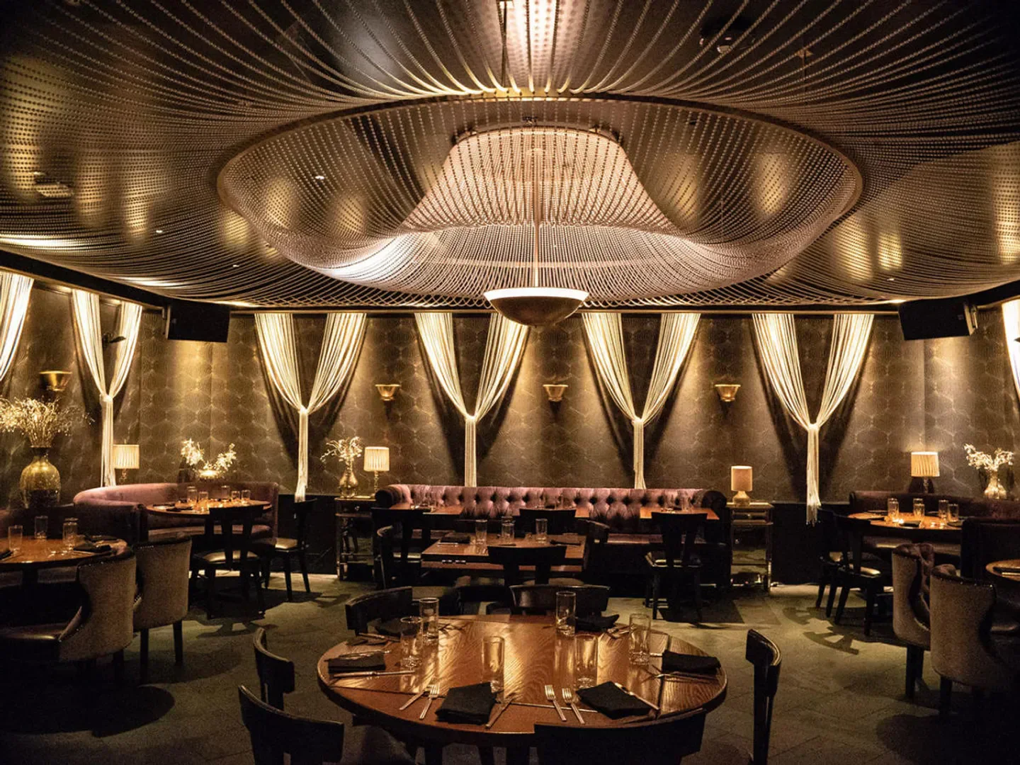 Elegant interior of Beauty & Essex restaurant in Las Vegas, with unique lighting and design.