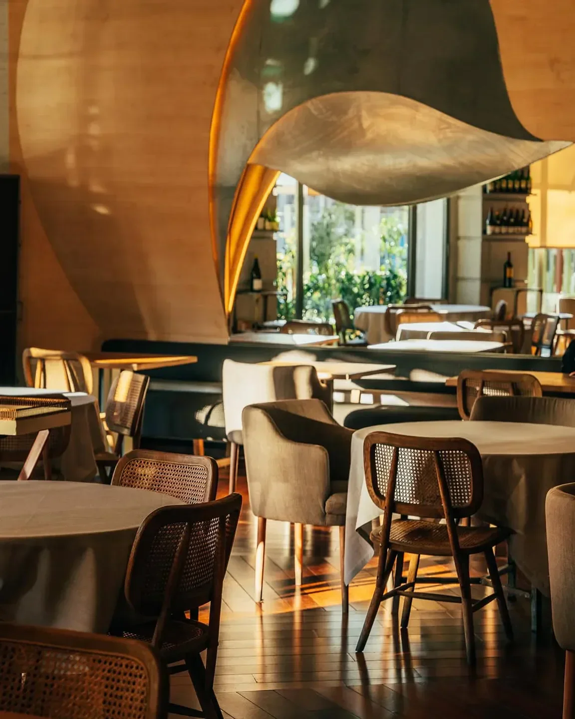 Interior of Berria restaurant in Madrid, with stylish design and warm lighting.