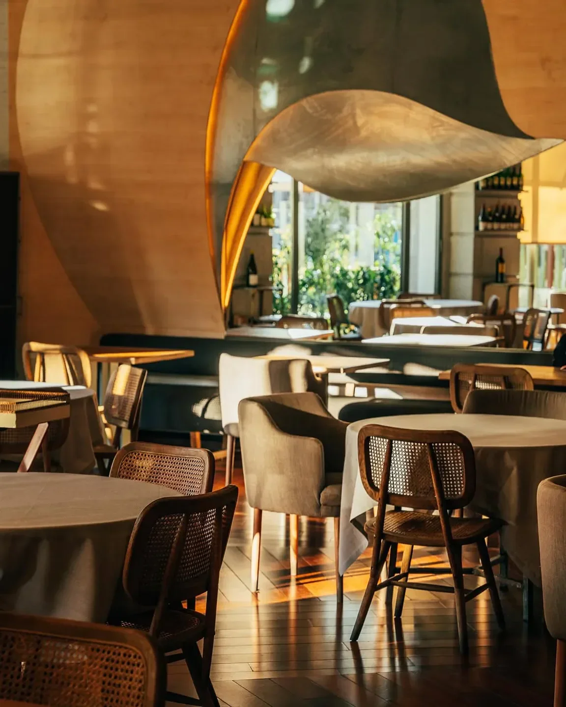 Interior of Berria restaurant in Madrid, with stylish design and warm lighting.