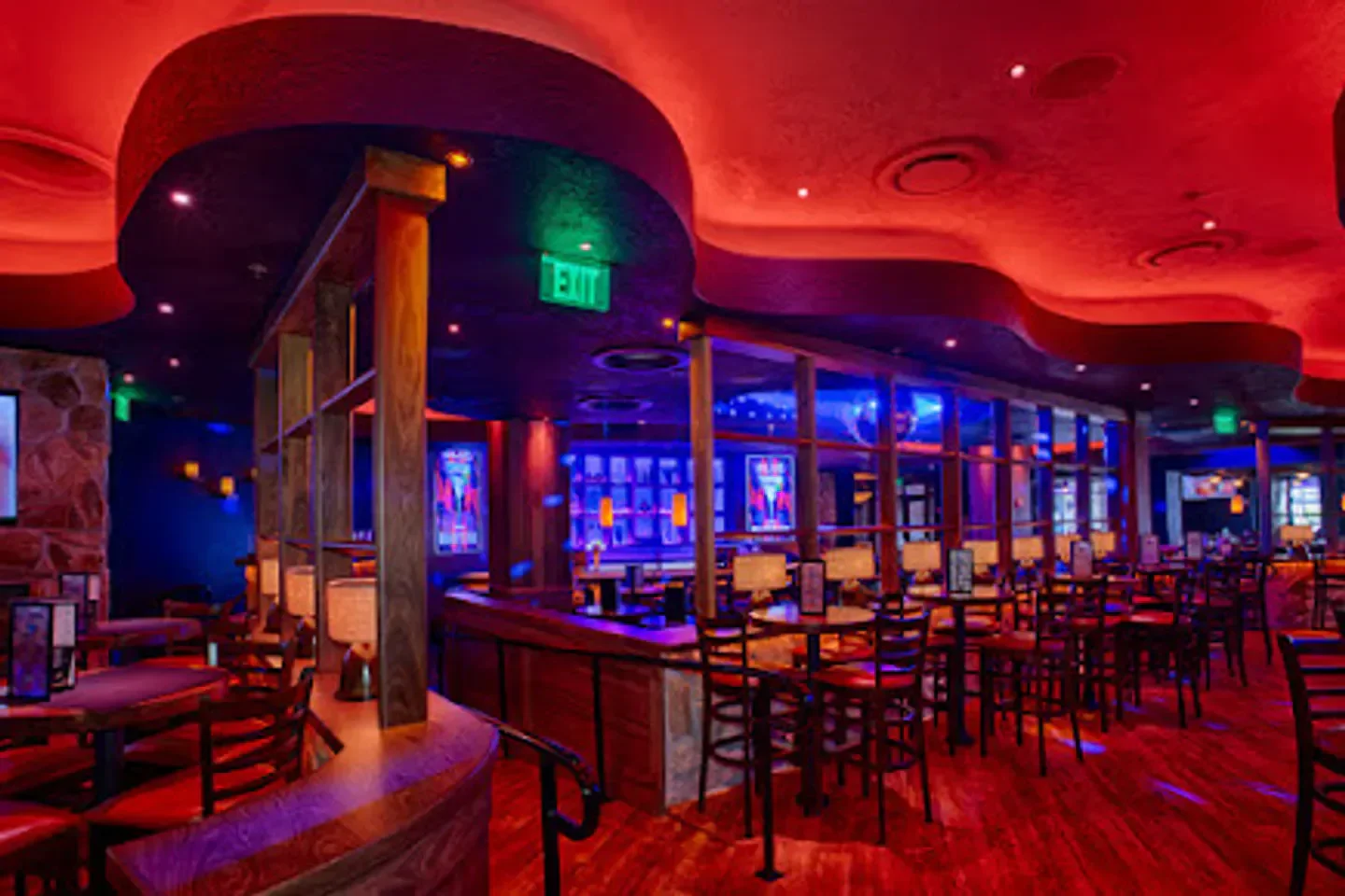 Interior view of Blue Martini Lounge in Orlando, with red and blue lighting