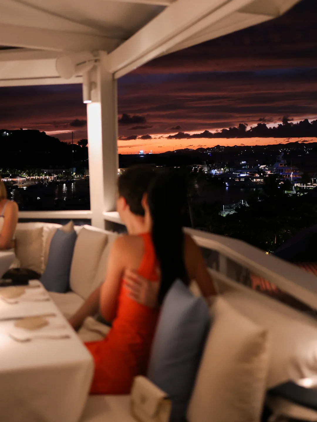 Bonito restaurant offers stunning sunset views over the city skyline and harbor.