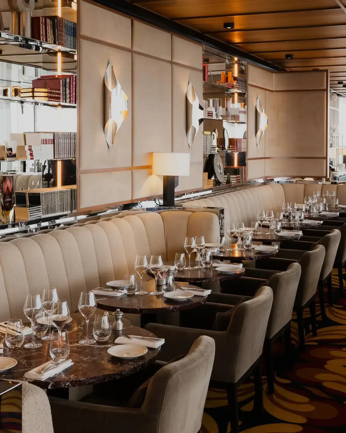 Elegant interior of Bonnie restaurant in Paris, featuring a stylish dining area with tables set.