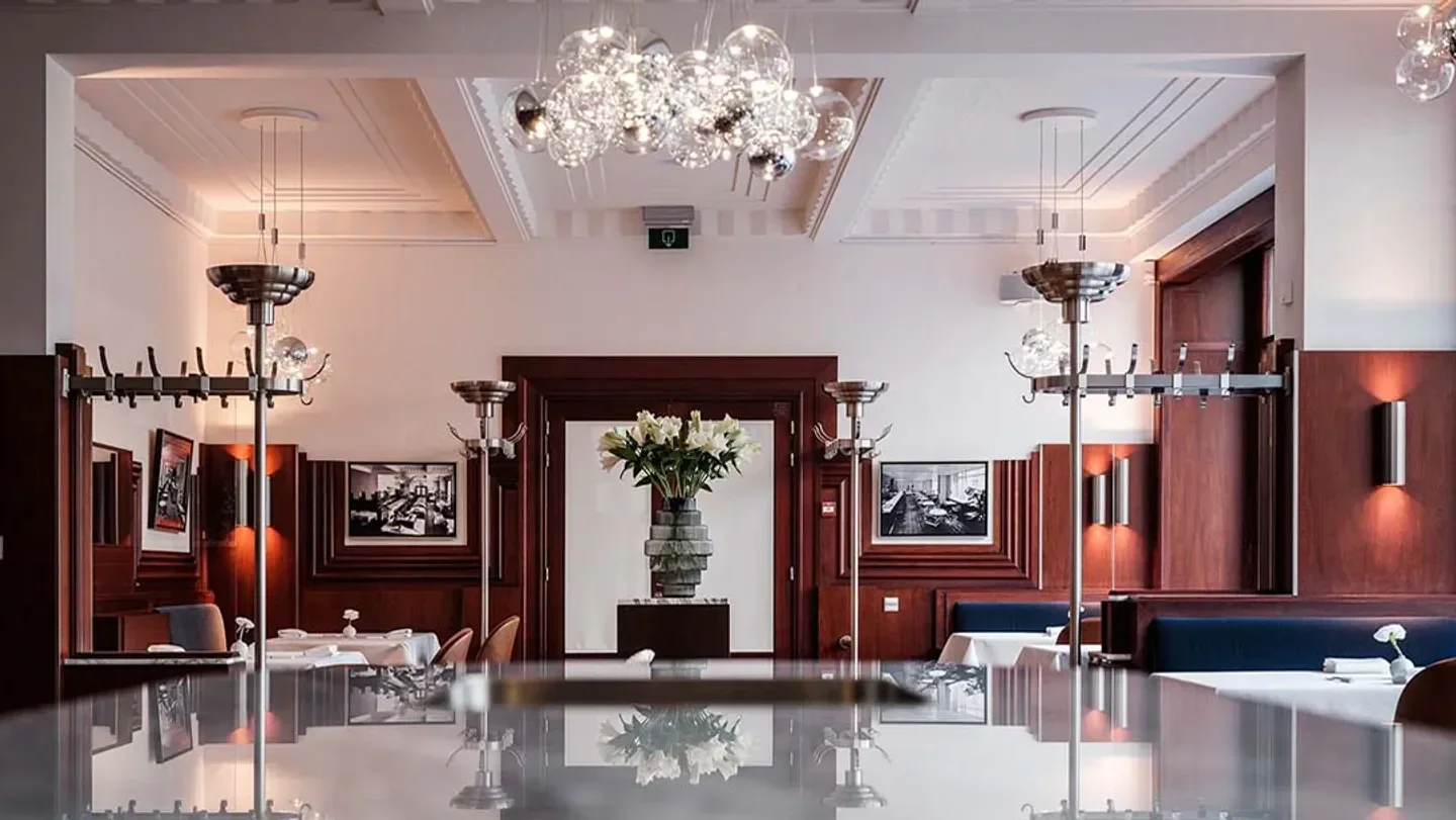 Elegant interior of Bozar Restaurant in Brussels, featuring stylish decor and lighting.