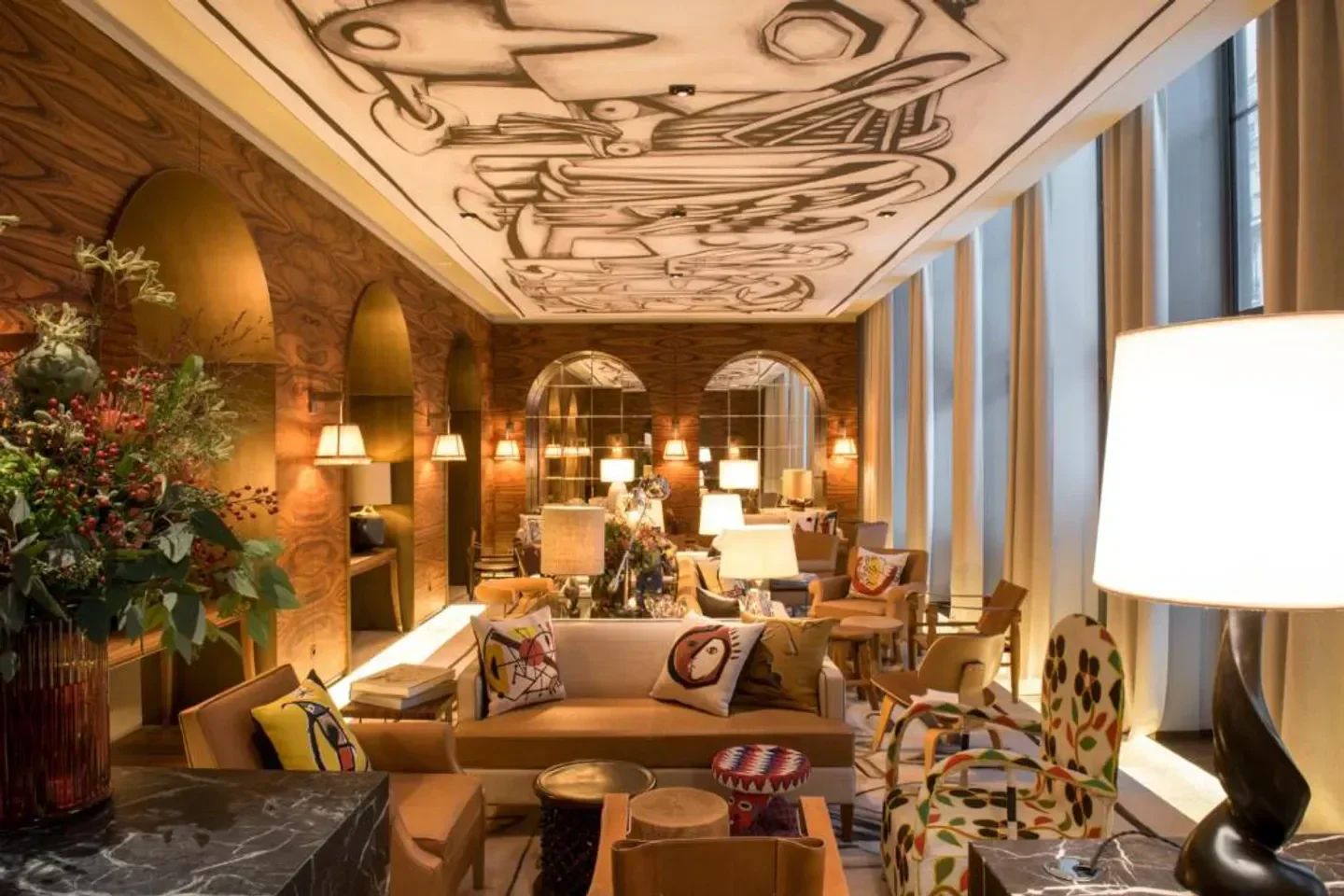 Interior of Brach restaurant in Paris, featuring unique art and cozy seating