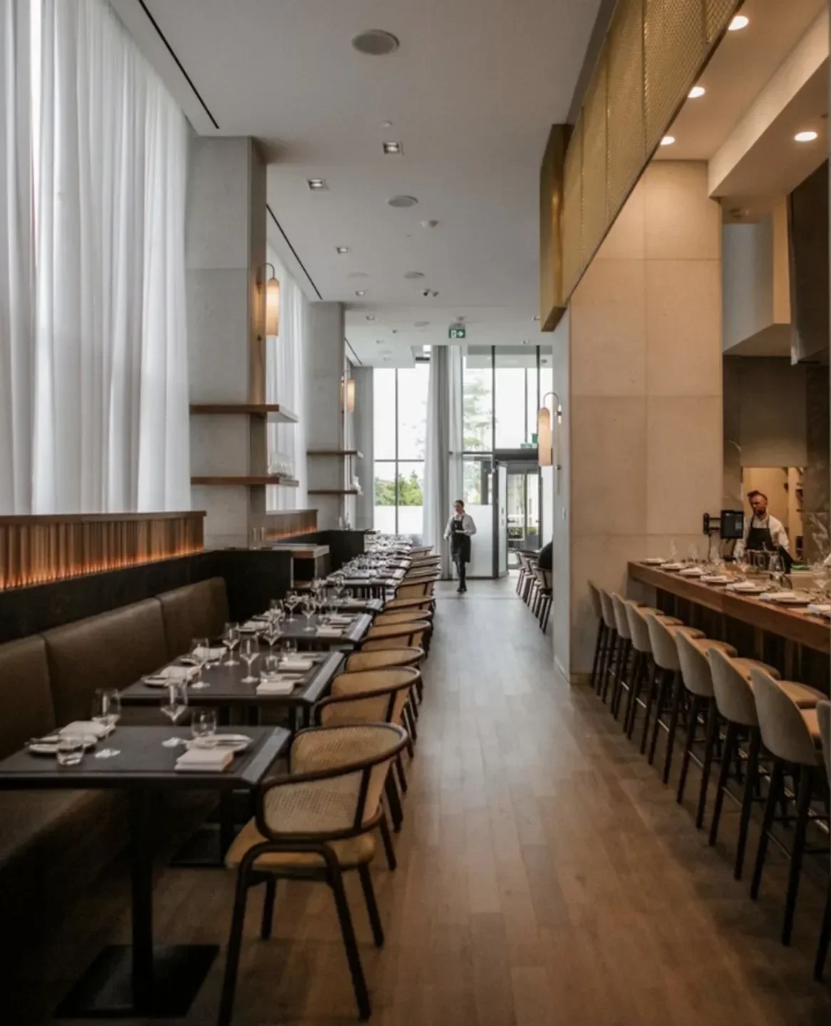Interior dining space at Buca Osteria & Bar in Toronto with stylish seating