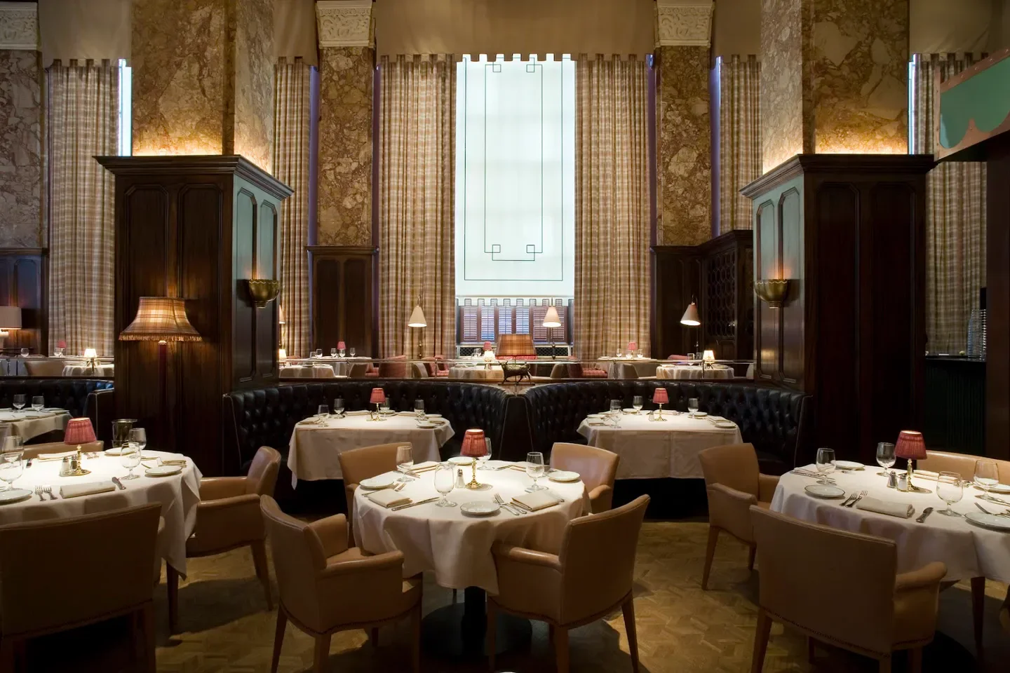 Interior of Butcher and Singer restaurant in Philadelphia with tables set for dining