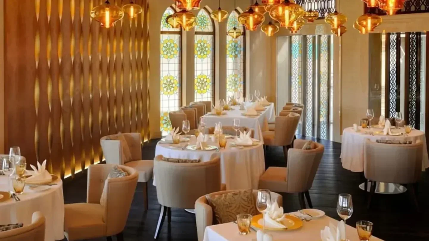 Elegant dining room at Byblos sur Mer in Abu Dhabi, perfect for a fine meal.