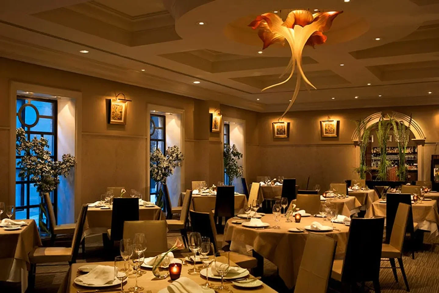 Elegant dining room at Campton Place restaurant in San Francisco with flower chandelier