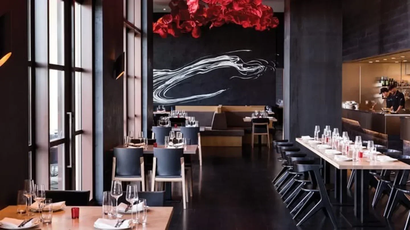 Interior of Capa restaurant in Orlando, featuring modern decor and dining tables.