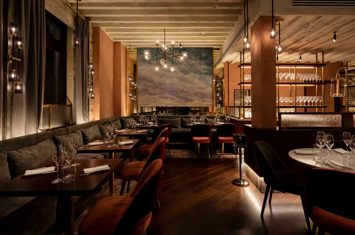Interior of Caractère restaurant in London, featuring stylish decor and ambient lighting.