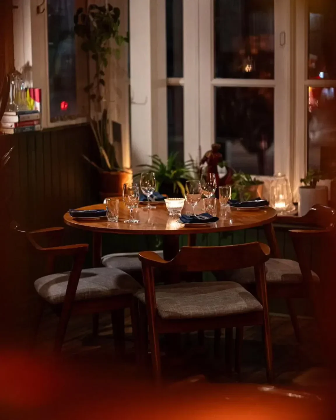 Cozy dining setting at Casa Paco restaurant in Toronto, ready for dinner service.