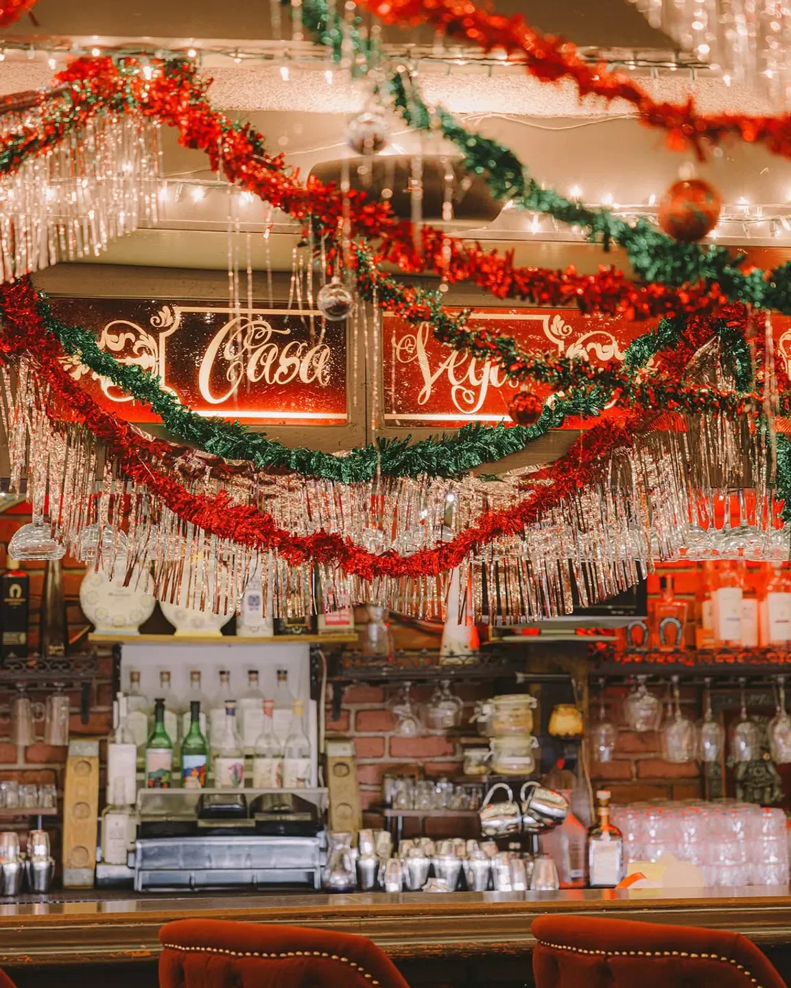 Festive decor inside Casa Vega restaurant in Los Angeles, California with Christmas garlands