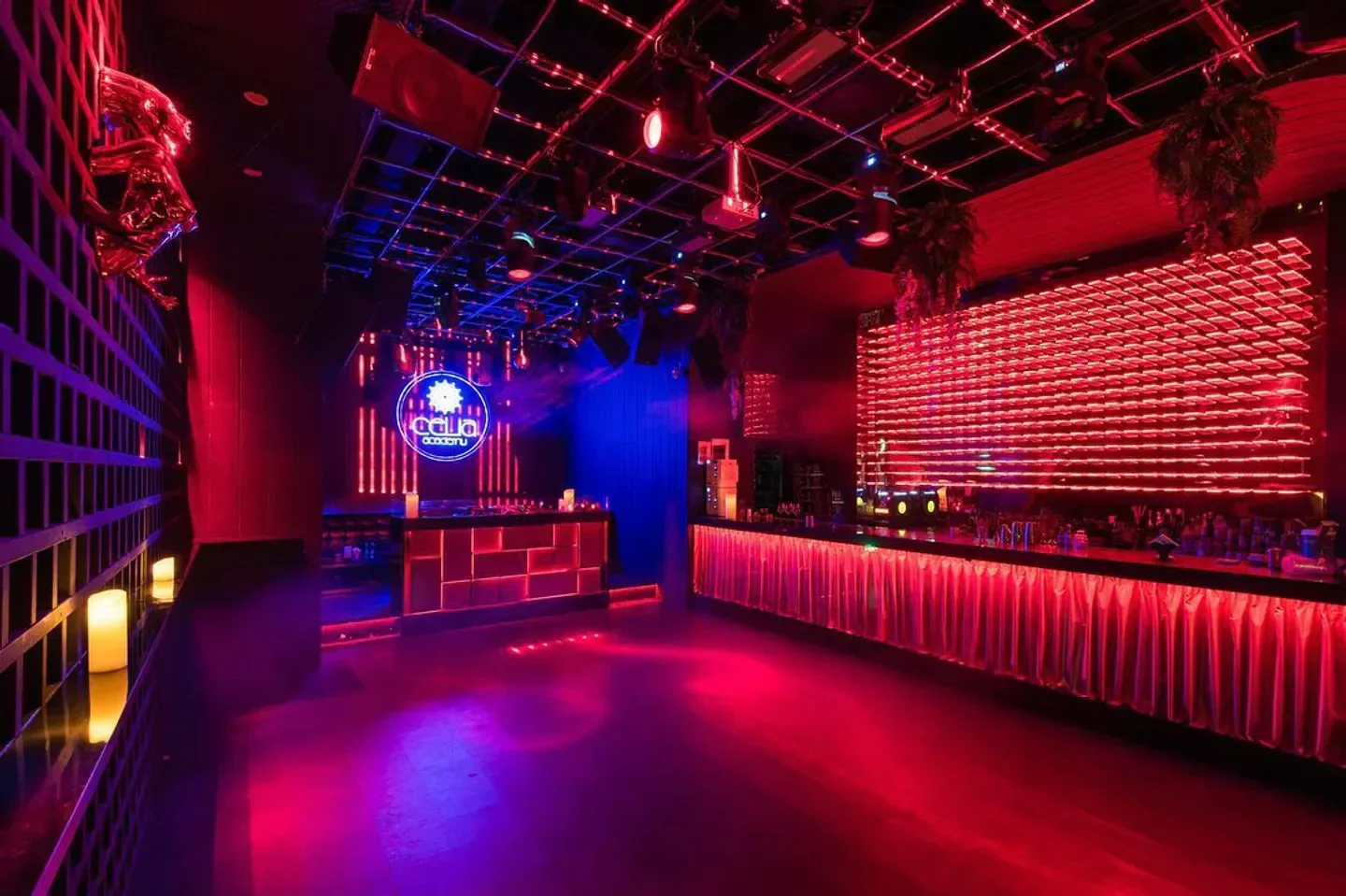 Interior of Celia by Pulse nightclub in Shanghai, with red and blue neon lights.