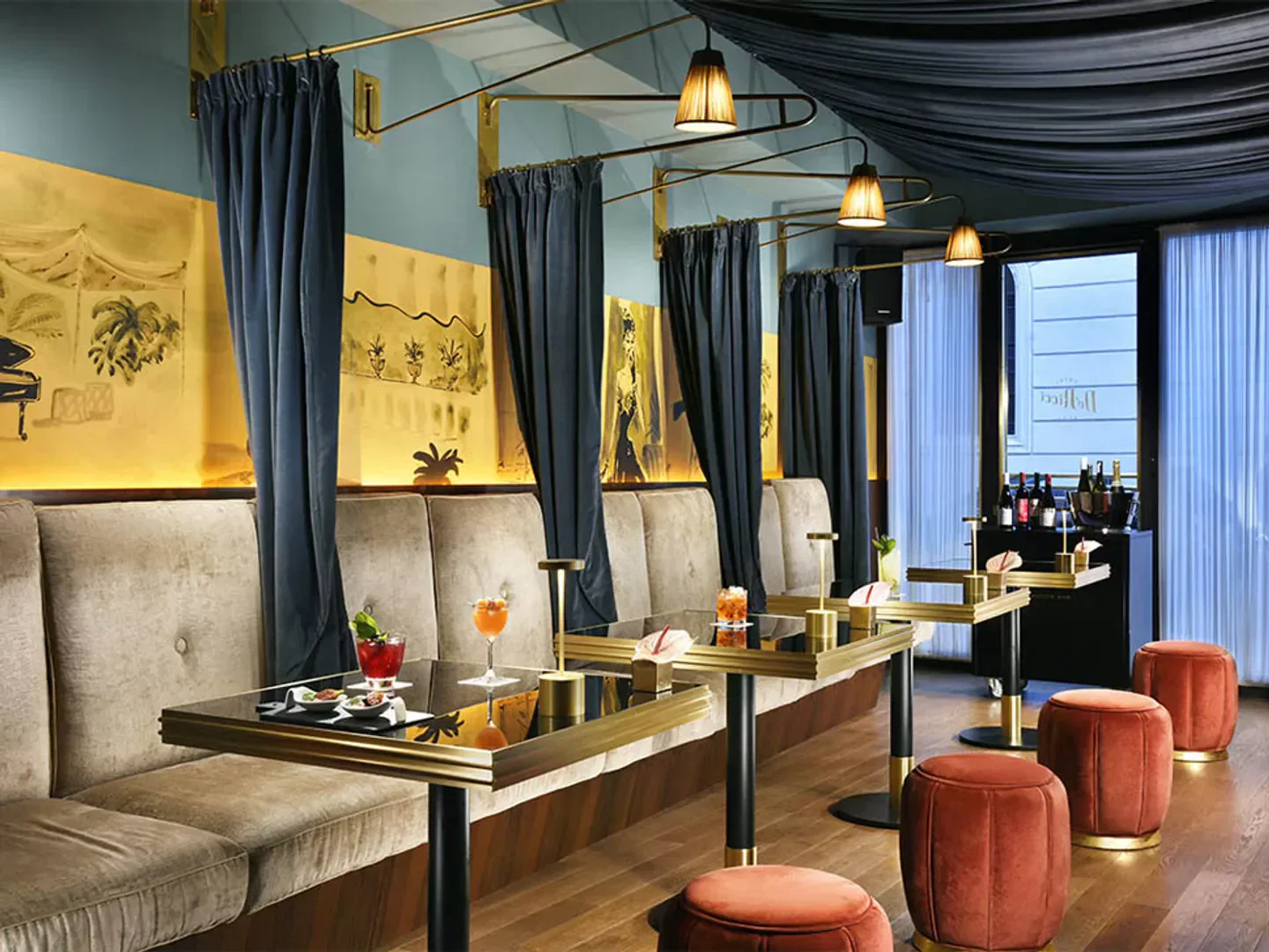 Elegant interior of Charade Bar in Rome with cocktails and stylish decor.