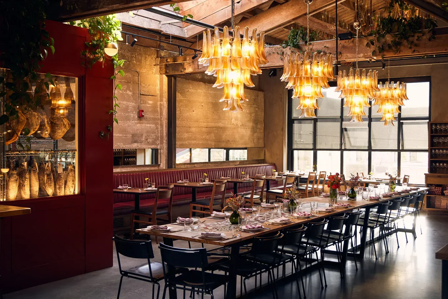 Interior of Che Fico restaurant in San Francisco with stylish lighting and decor