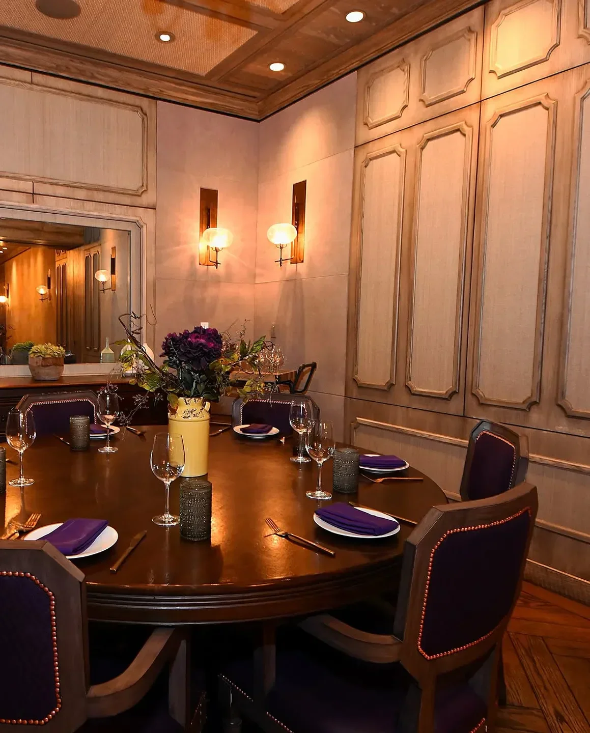 Chica restaurant in Las Vegas, elegant dining room with round table set for guests.