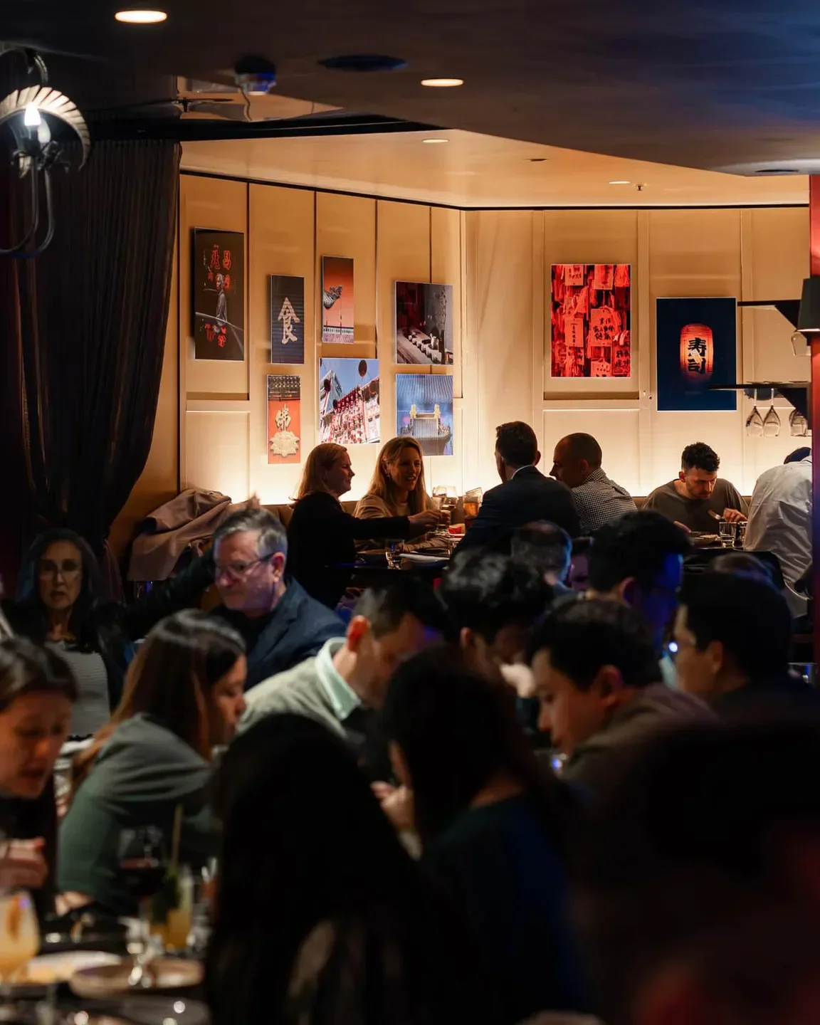 Busy dining room at China Lane restaurant in Sydney, filled with patrons enjoying a meal.