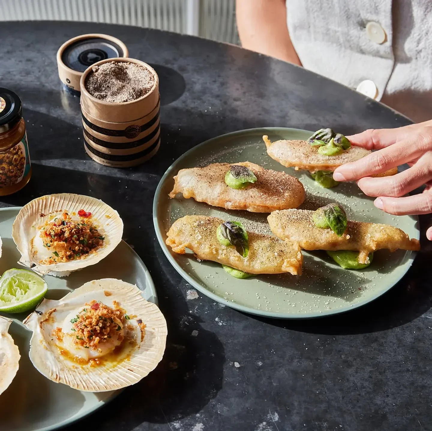 Delicious seafood dishes at Chiswick Woollahra restaurant in Sydney, featuring fresh scallops and fish.
