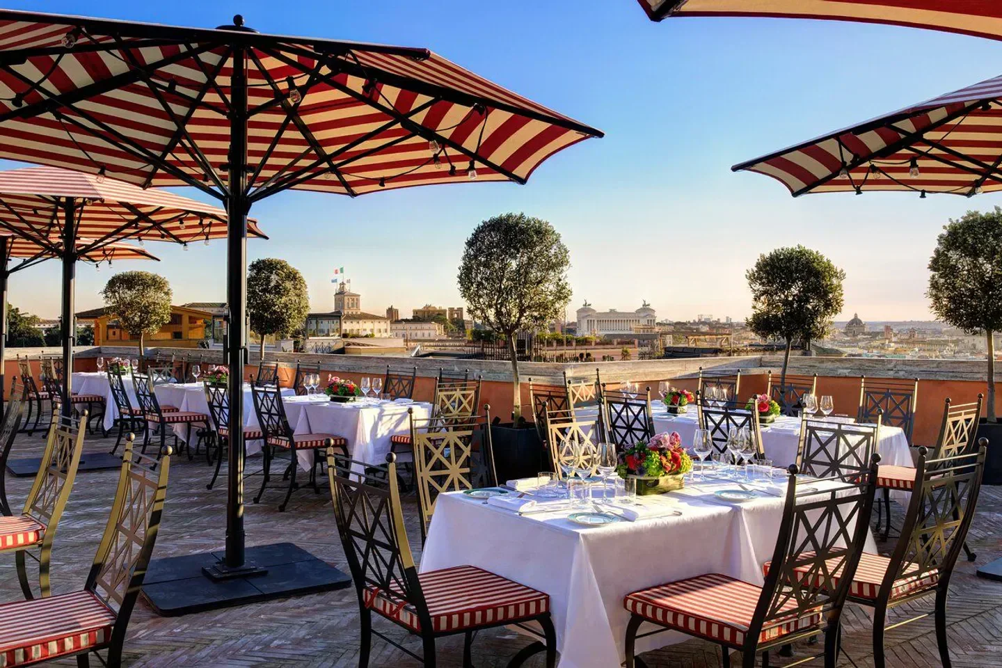 Cielo Terrace restaurant in Rome with tables set for dining and city views