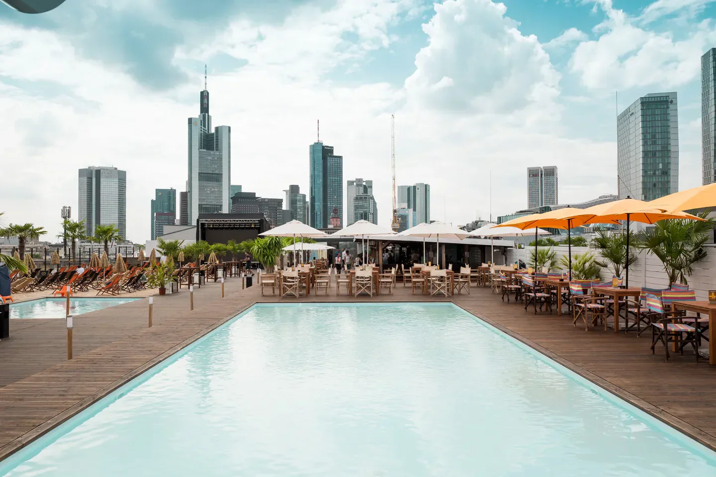 Rooftop pool at Citybeach Frankfurt with city views and beach club ambiance.