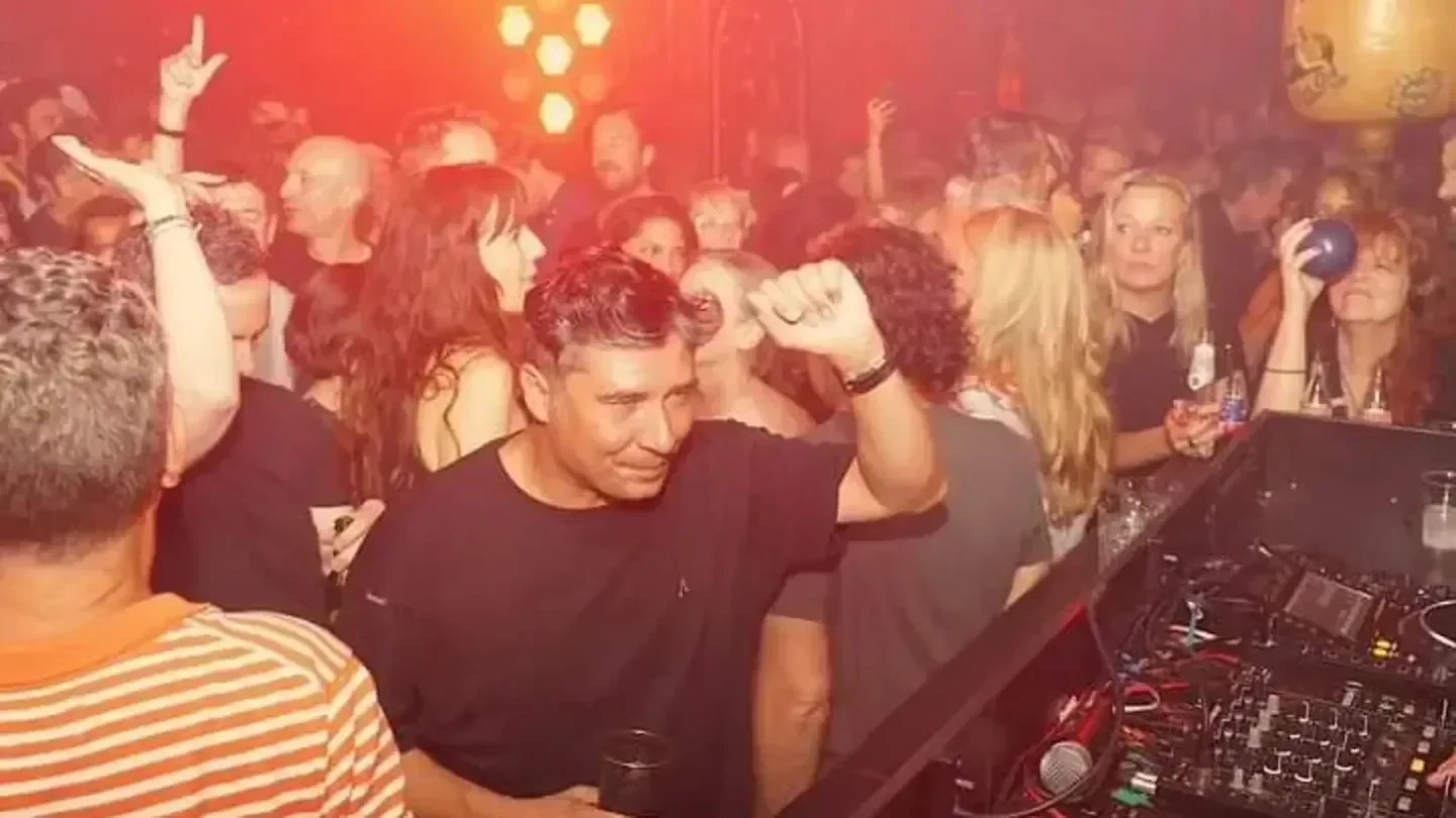 Energetic crowd at ClubNl Amsterdam nightclub enjoying the music and atmosphere.