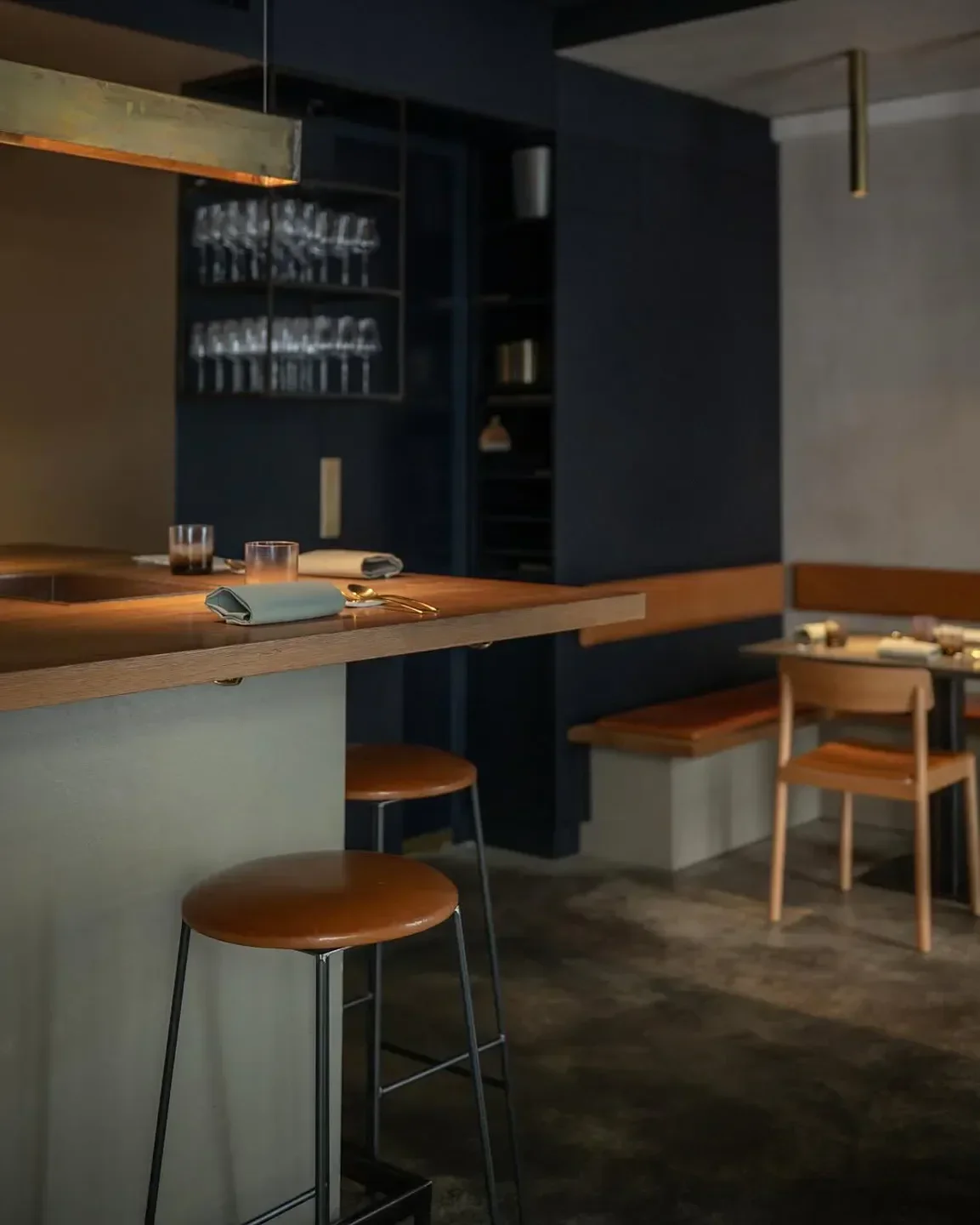 Interior of CODA Dessert Dining in Berlin with bar stools and stylish seating.