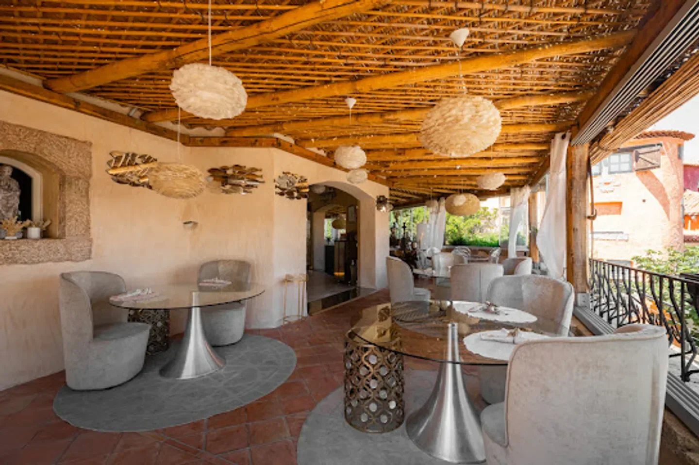 Elegant dining at Confusion restaurant in Porto Cervo, featuring unique lighting and decor.