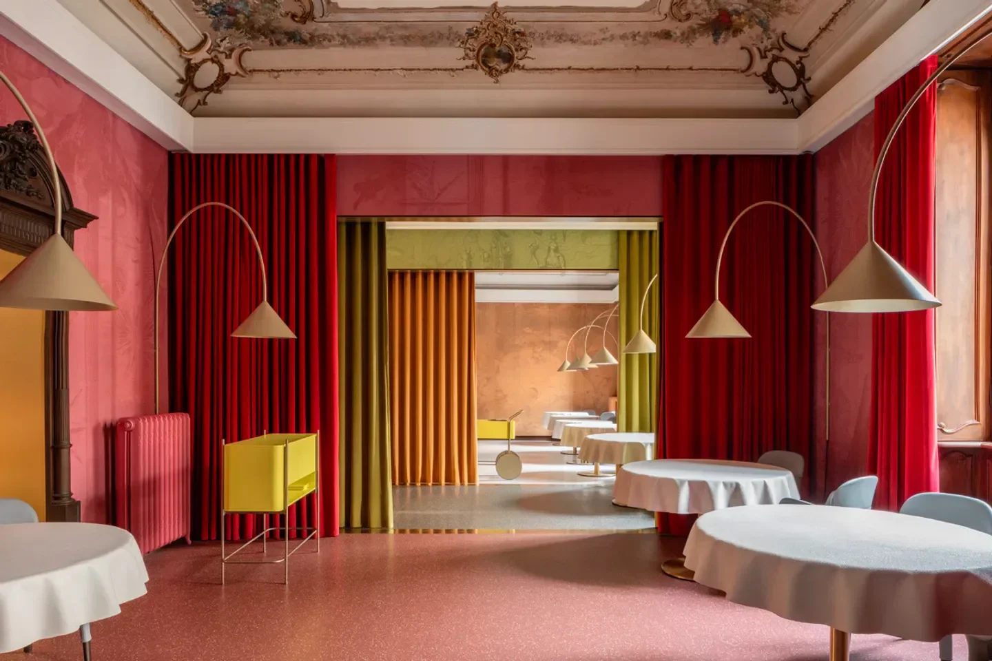 Interior of Contraste restaurant in Milan, featuring elegant design and colorful decor.