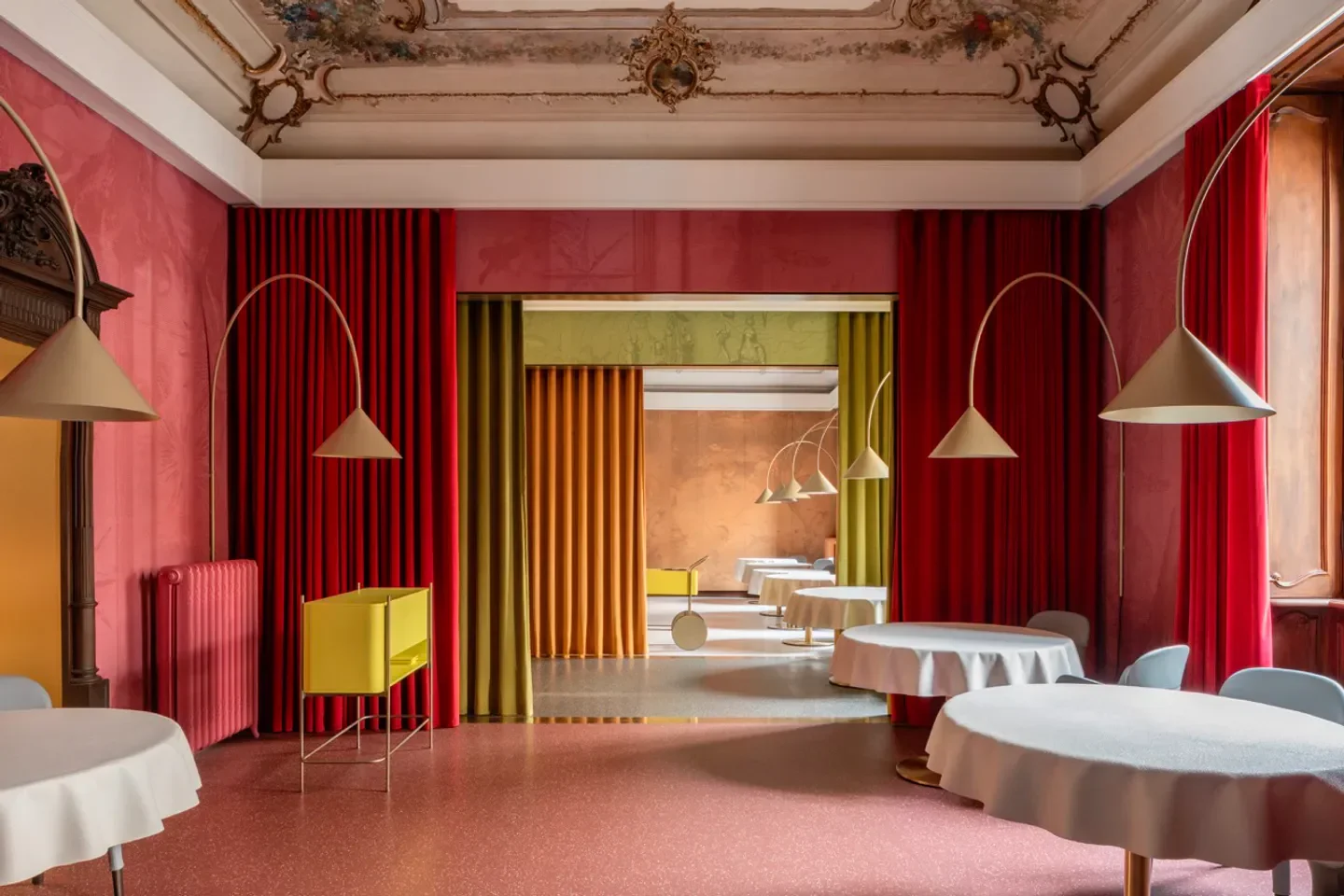 Interior of Contraste restaurant in Milan, featuring elegant design and colorful decor.