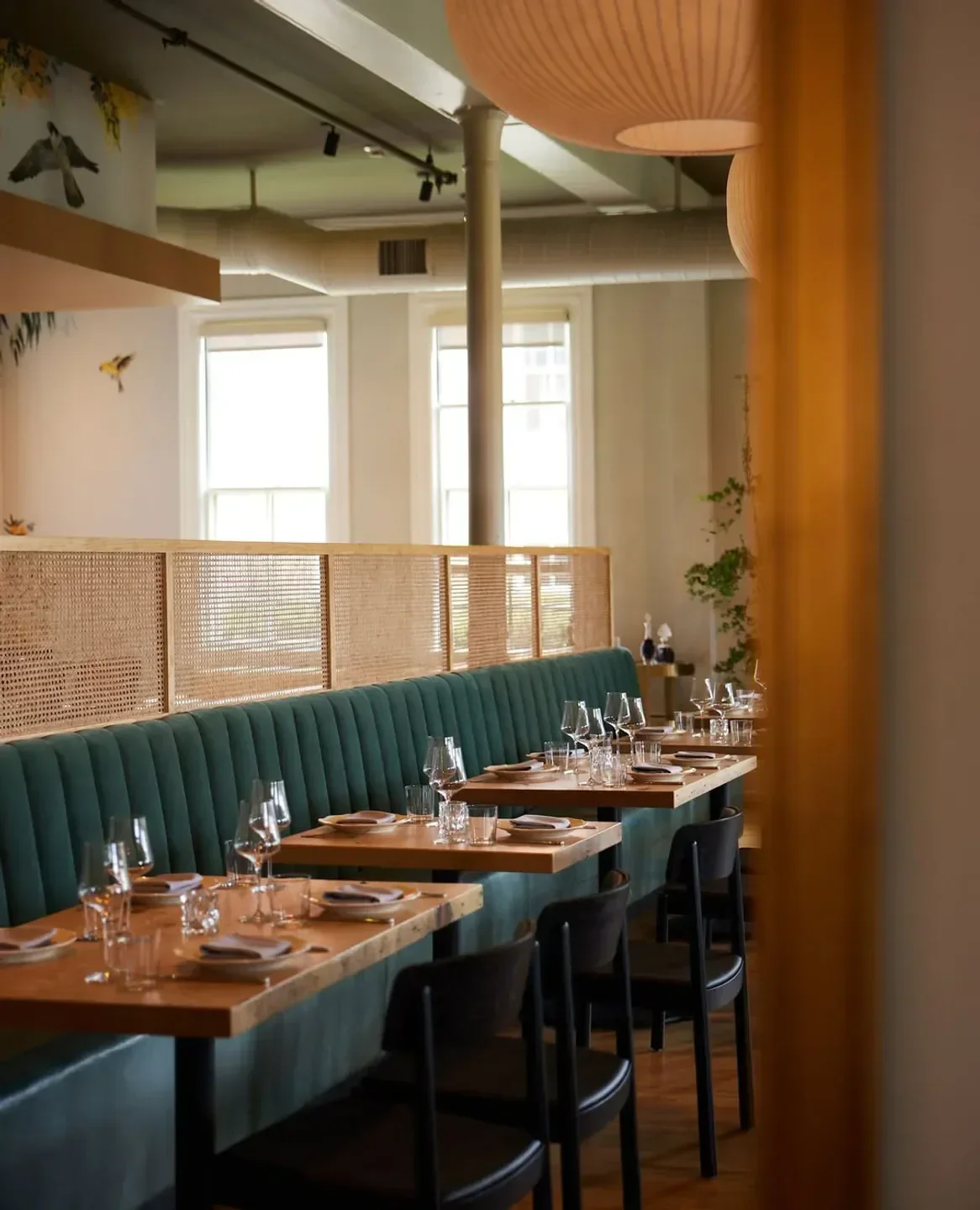 Interior of Dalida restaurant in San Francisco, featuring elegant dining tables and decor.
