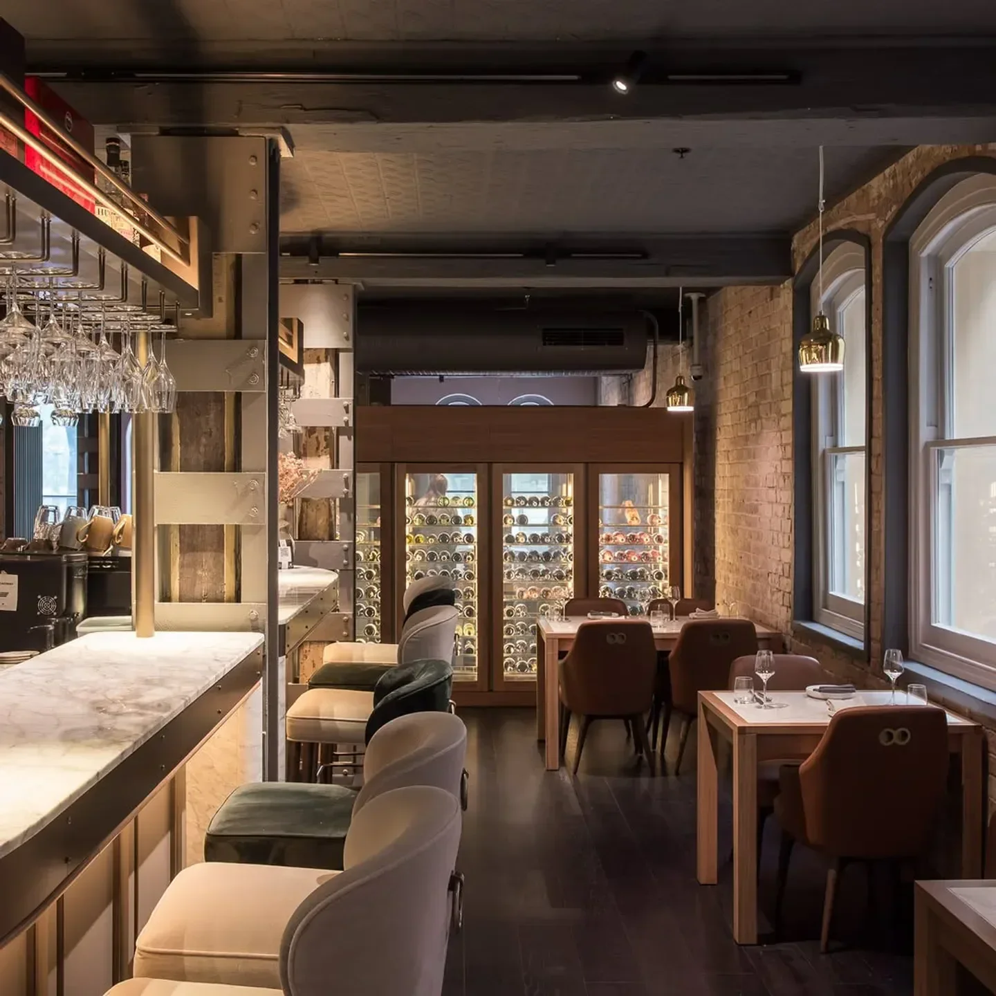Interior of Dixson & Sons restaurant in Sydney, showcasing a stylish bar and dining area.