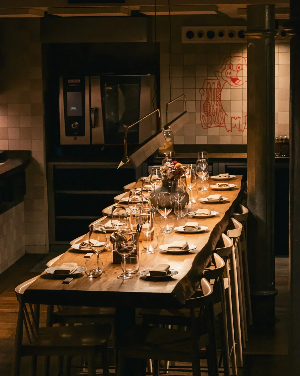 Dining table set at Dos Pebrots restaurant in Barcelona, ready for service.