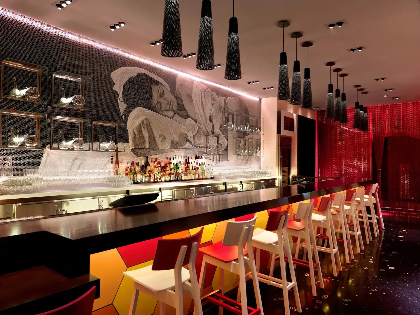 Stylish bar at é by José Andrés in Las Vegas, with modern design and artwork.