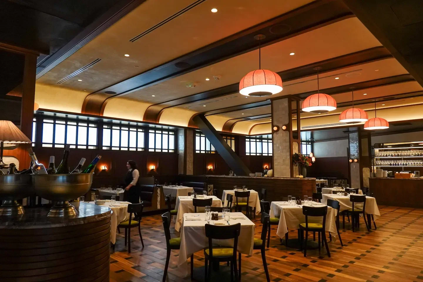 Interior of Eastern Standard restaurant in Boston, with tables and stylish lighting