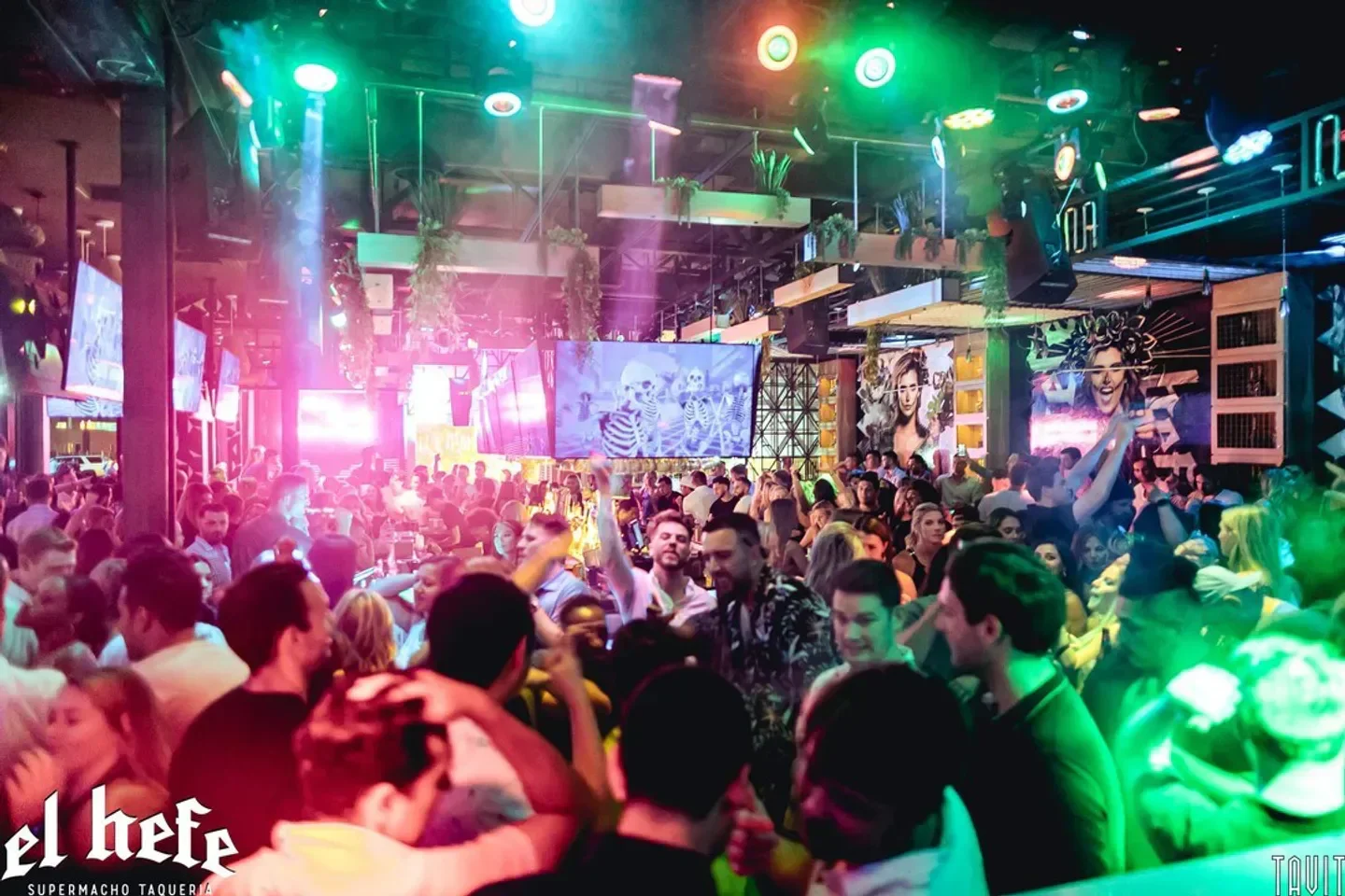 Energetic crowd at El Hefe nightclub in Scottsdale, with vibrant lighting and lively atmosphere.